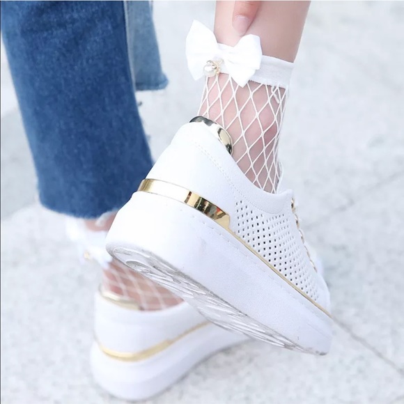 white fishnet socks with bow